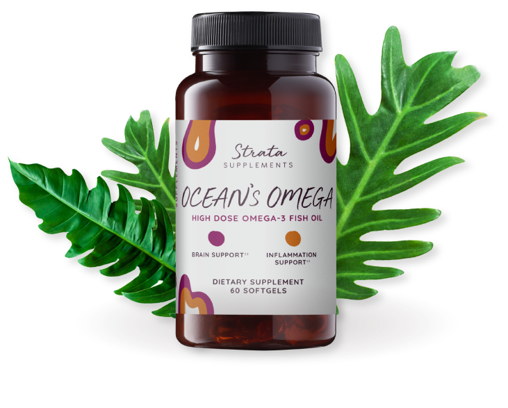 Glass bottle of Ocean's Omega Omega 3 Fish Oil surrounded by leaves
