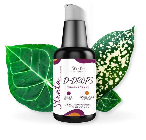 Pump bottle of liquid vitamin D surrounded by plant leaves, D-Drops, Strata Supplements, DC