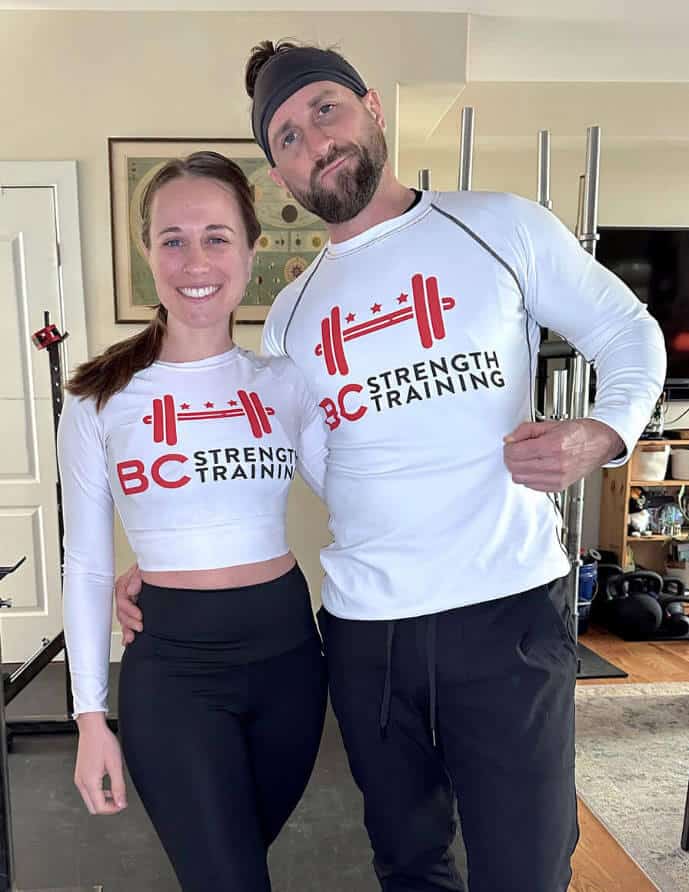 Kylie of Strata Nutrition and Bryan of BC Strength Training stand together both wearing BC Strength Training workout shirts